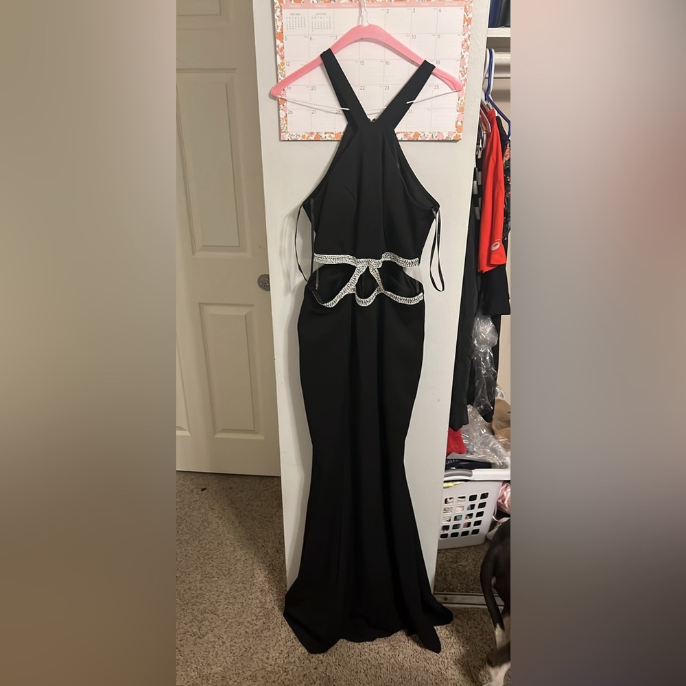 Used once… Beautiful elegant dress with beading made from pearls and crystals.